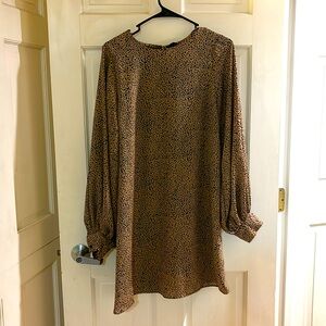A cheetah print dress. 
Size Medium
